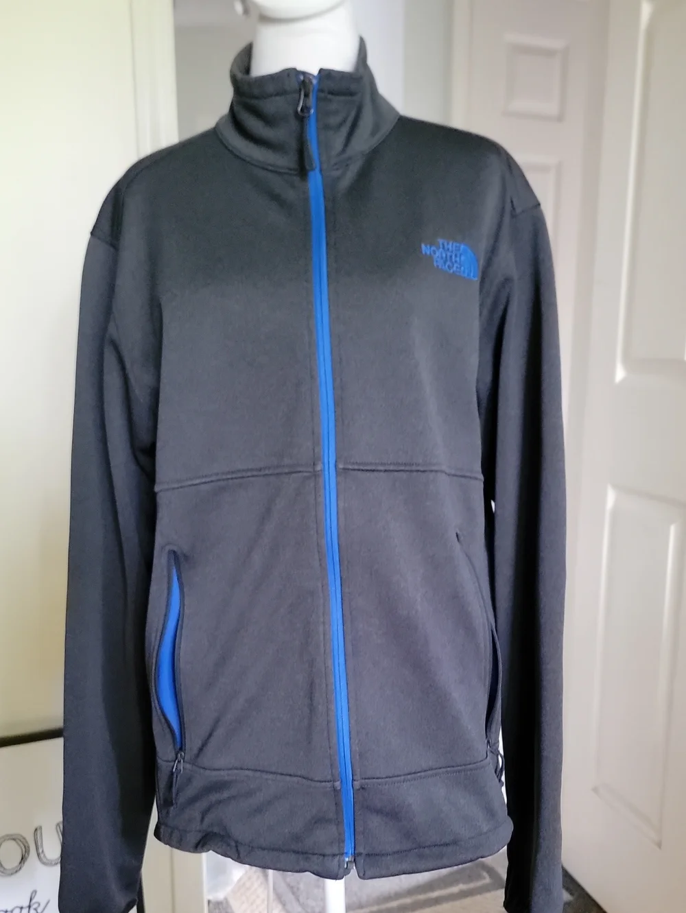 The North Face Black Jacket with Blue Accents